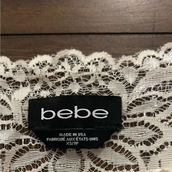 BEBE Cream Lace Panel Peplum Top Size XS - Picture 4 of 10